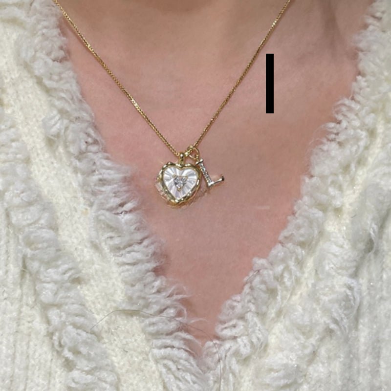 Collar de Nácar Natural y Acero de Titanio - Melvanni